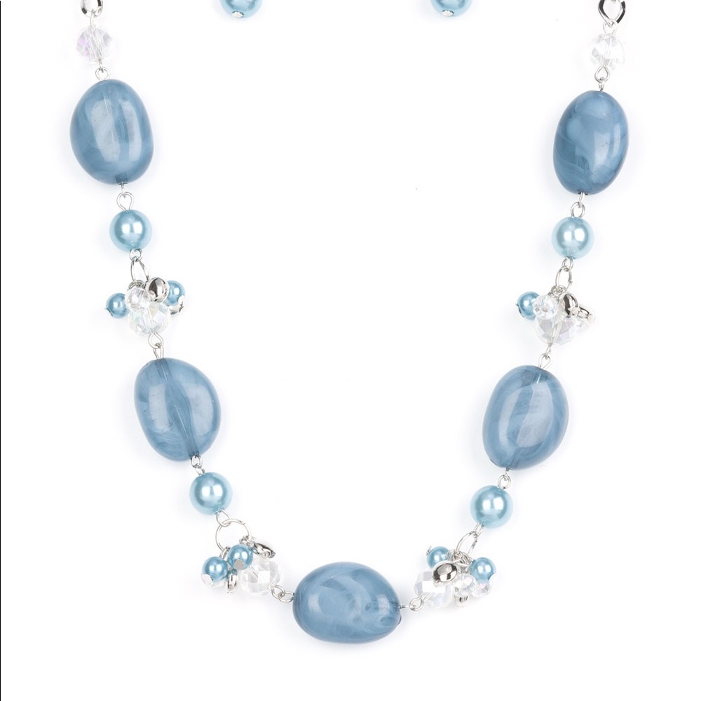 Light blue matching necklace and bracelet.